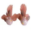 BIRD PINK FEATHERS 7″ PINK GLITTER W/ CLIP 2 ASSTD.