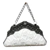 ORN BLACK/WHITE HAND BAG 3″ W/ CHAIN, JEWEL & GLTR.