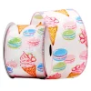 WIRED RIBBON 2.5″x10 YDS. WHITE/PINK W/ MULTI MACAROONS & ICE CREAM